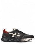 Sneakers Premiata Mick 7719 in pelle e suede nero con logo bianco e dettaglio rosso sul tallone. Comfort e stile per look invernali casual.