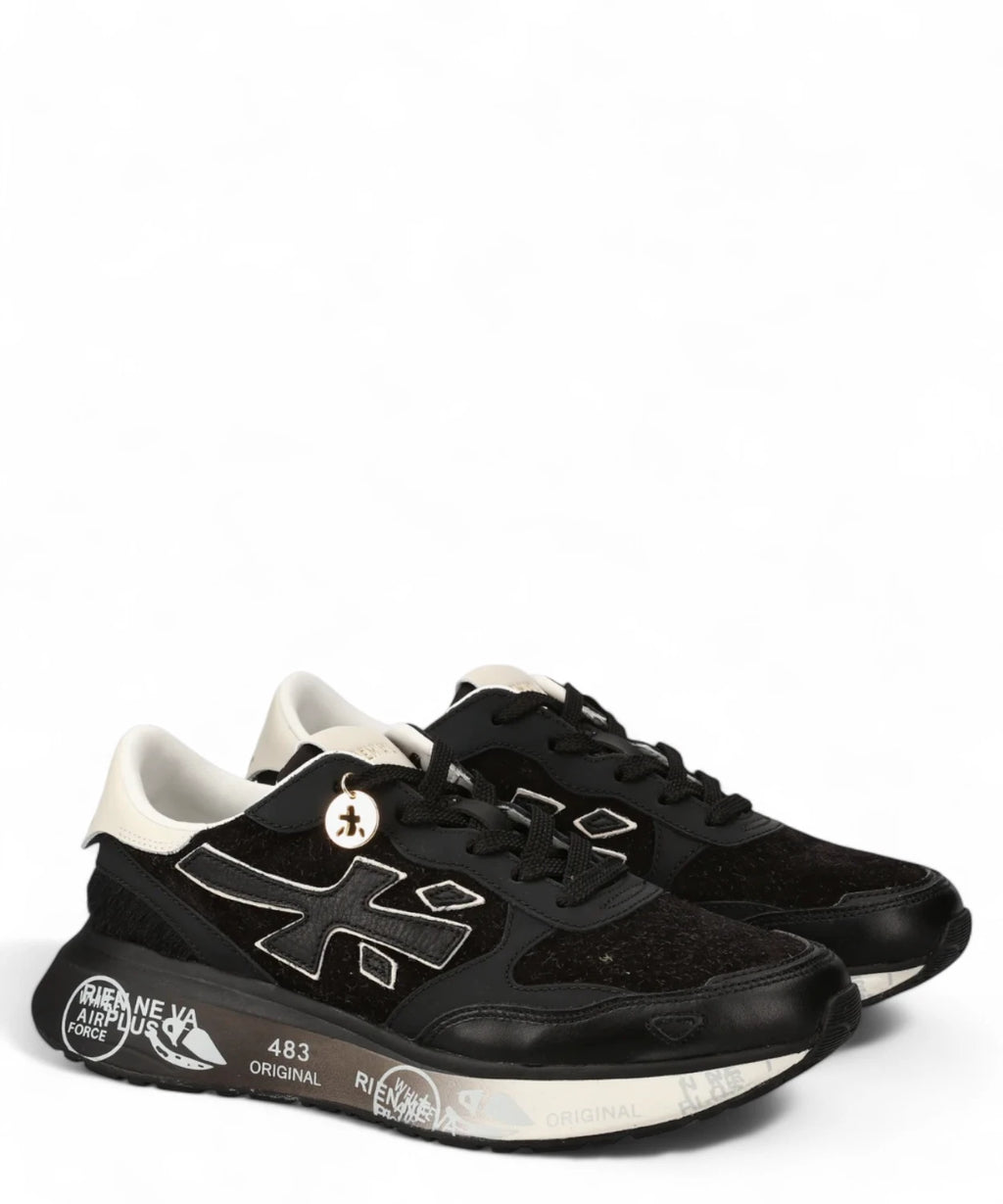 Coppia di Sneakers Lauryn 7803 Premiata da donna, in pelle nera e suola con stampa, stile contemporaneo per la stagione FW26.